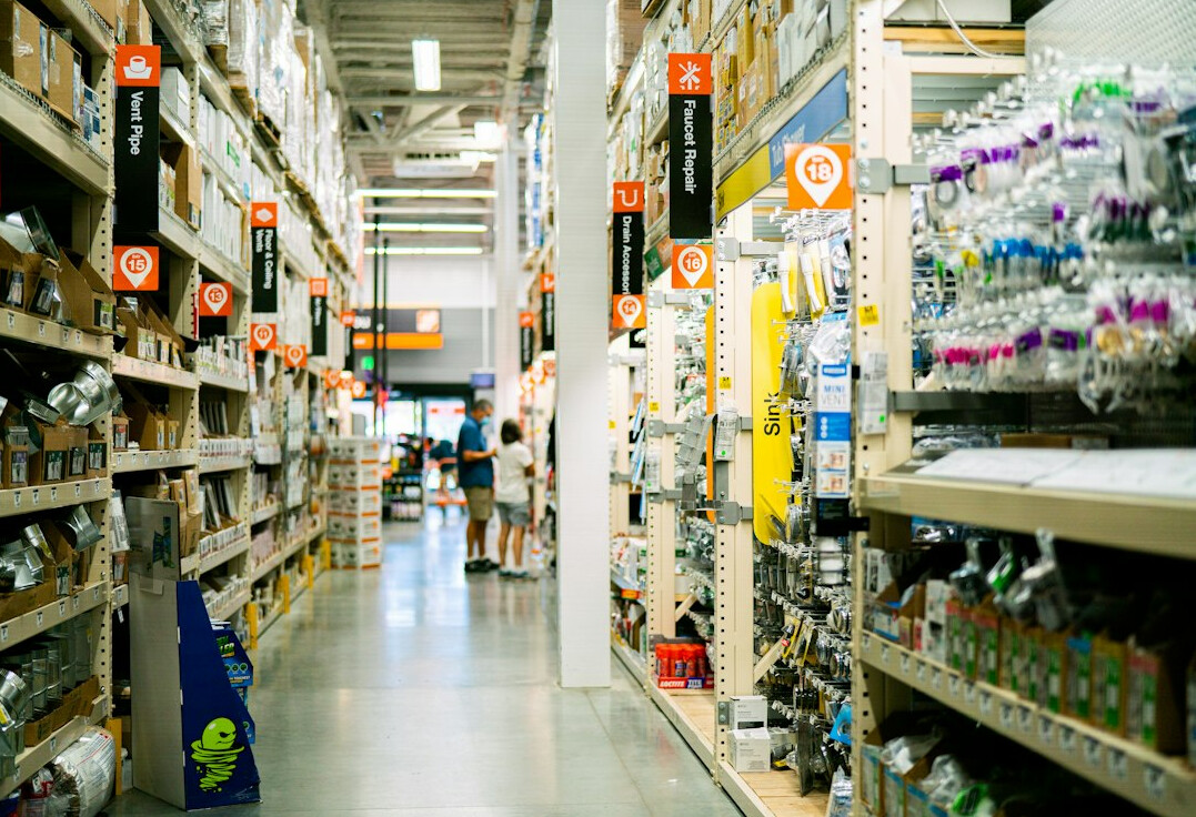 store detective observing shoppers