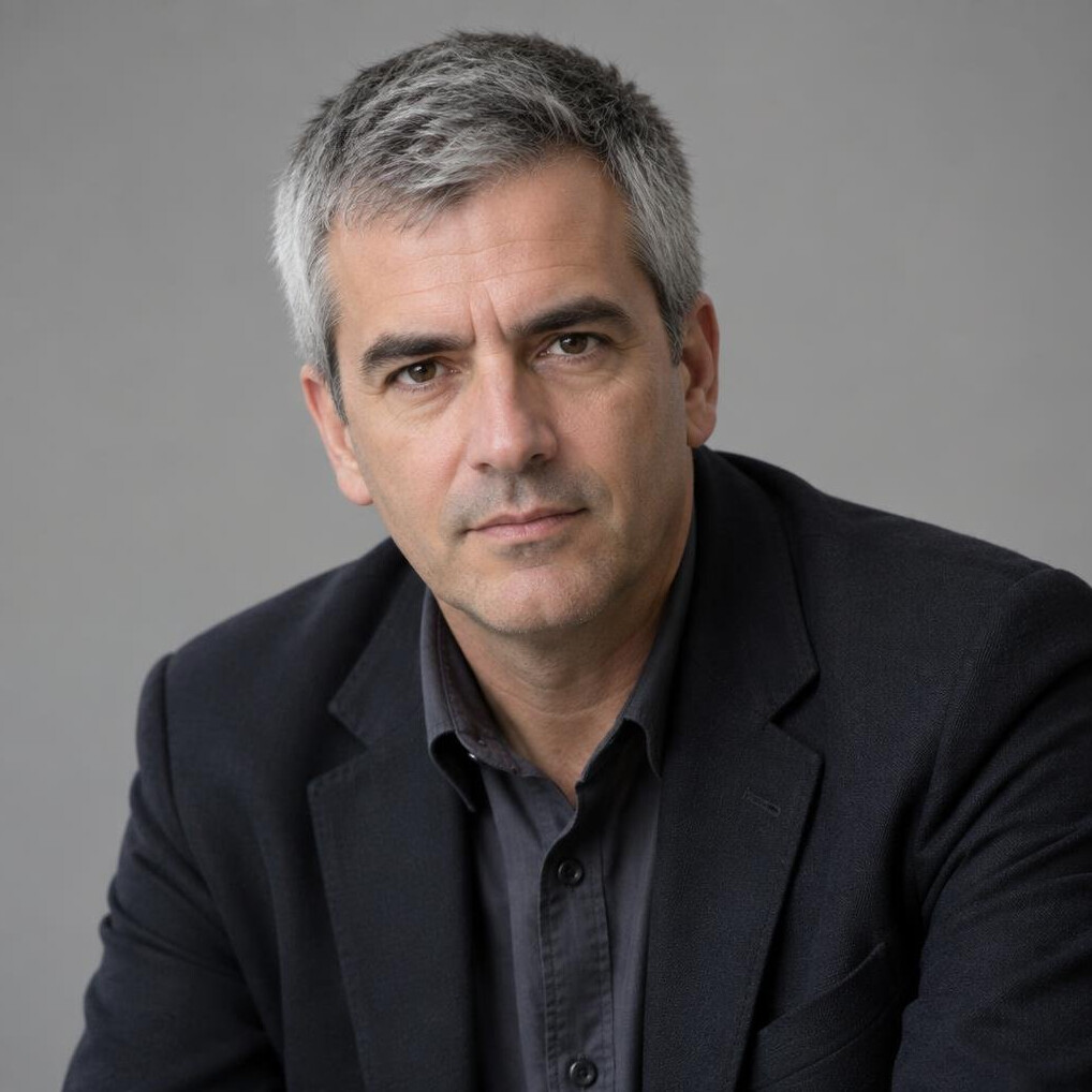 Portrait of a man journalist in a suit